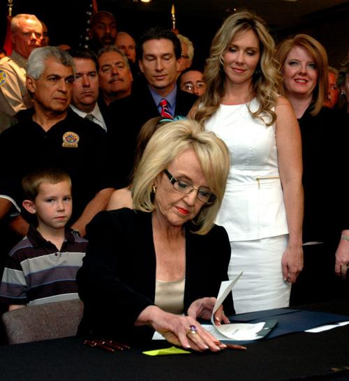 Gov. Jan Brewer signs survivor bill