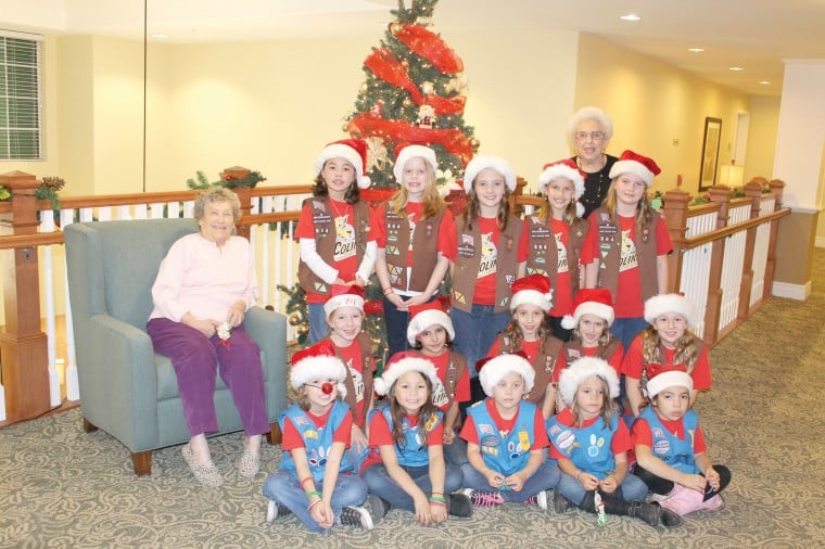 Local Brownie and Daisy troops bring joy with caroling