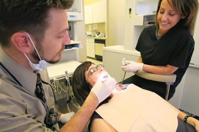 Local dentist offers low-cost exams to the uninsured 