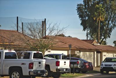 Free roofs putting a tiny Ahwatukee HOA on a ledge