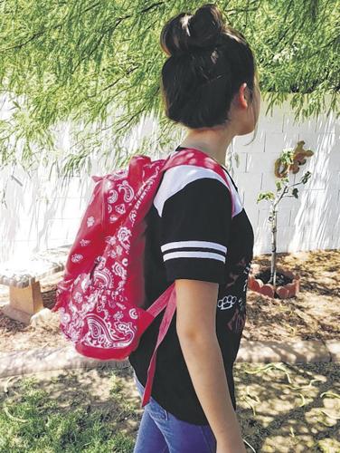 Take a weight off your child: beware of heavy backpacks