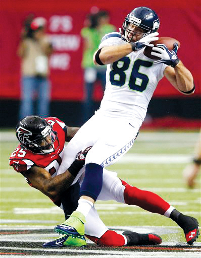 Zach Miller, William Moore