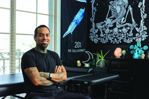 Ahwatukee tattoo artist went from metal to ink