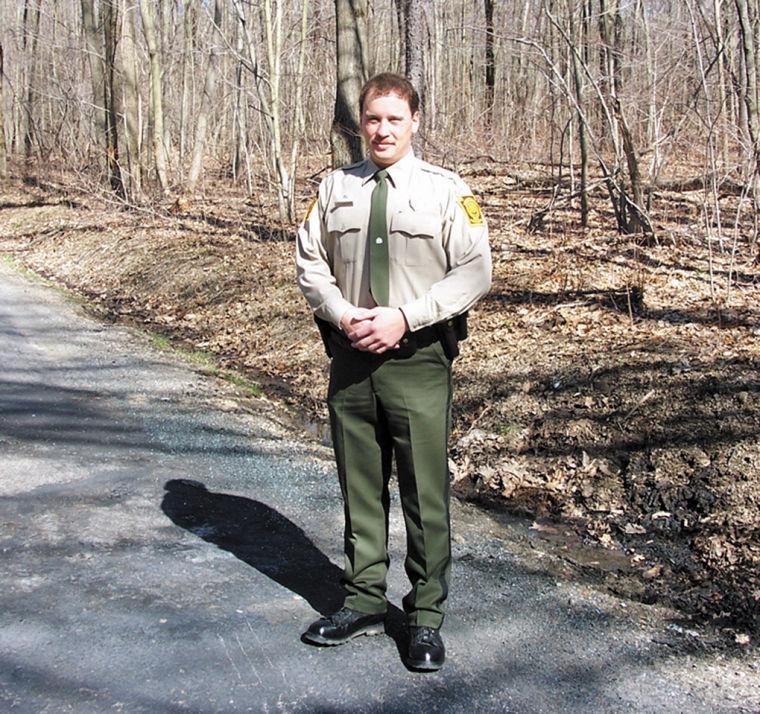 Game warden rescues injured man from burning car | News | alliednews.com
