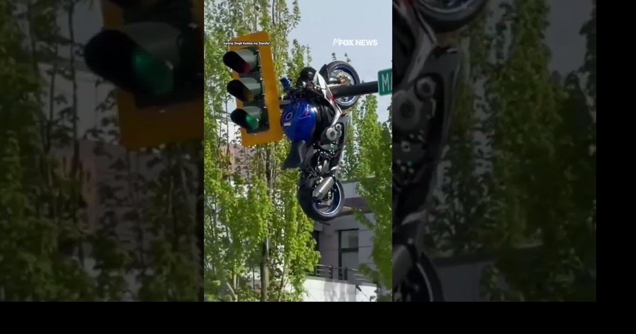 Motorcycle seen HANGING from traffic light after violent crash #shorts ...