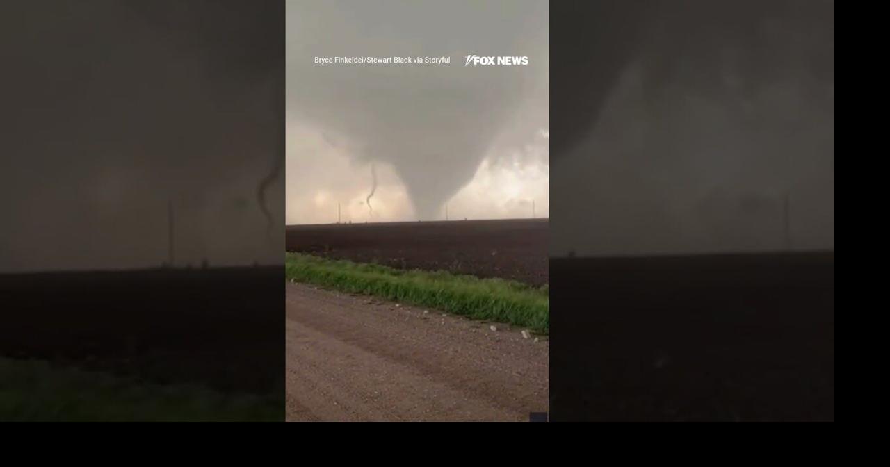 NEW: Storm chasers capture a rare moment as twin tornadoes spin side-by ...