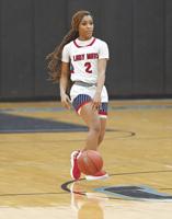 Lady Mavs' defense punches regional quarterfinal ticket