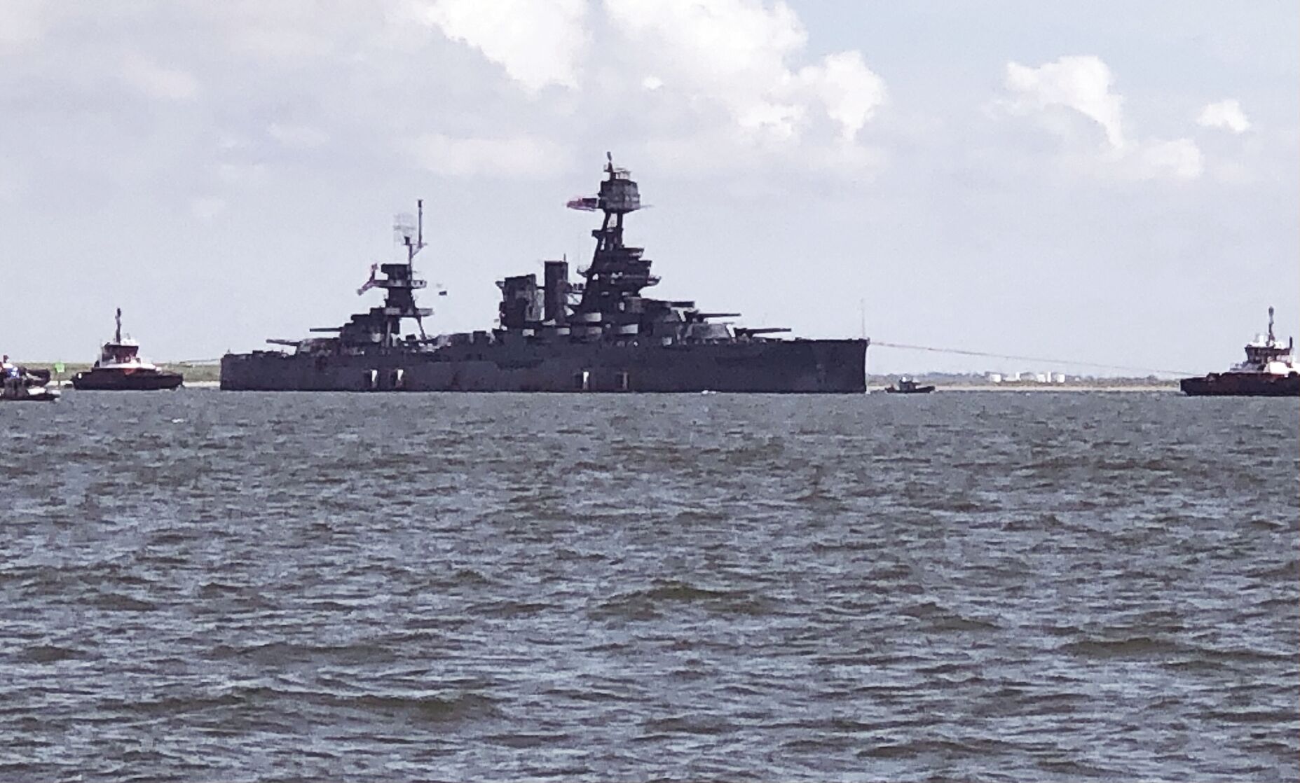 Local men watch USS Texas moved for repairs News alvinsun