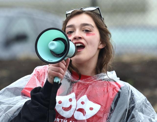 North Andover students walk out in opposition to announced teacher cuts ...