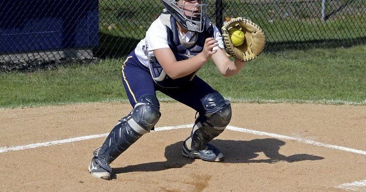 Following Harry; Roche finds shining example behind the plate in her ...