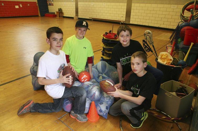 A team of HEROS; Students collect, donate used sports equipment to kids