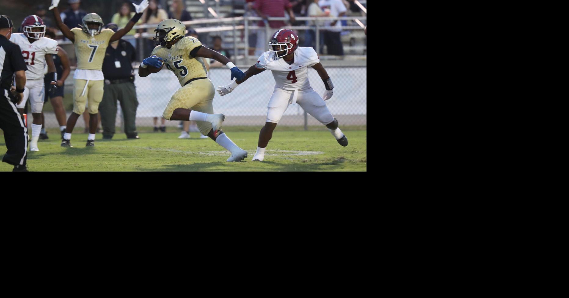 Photos Jacksonville vs. Handley action, band and cheer shots