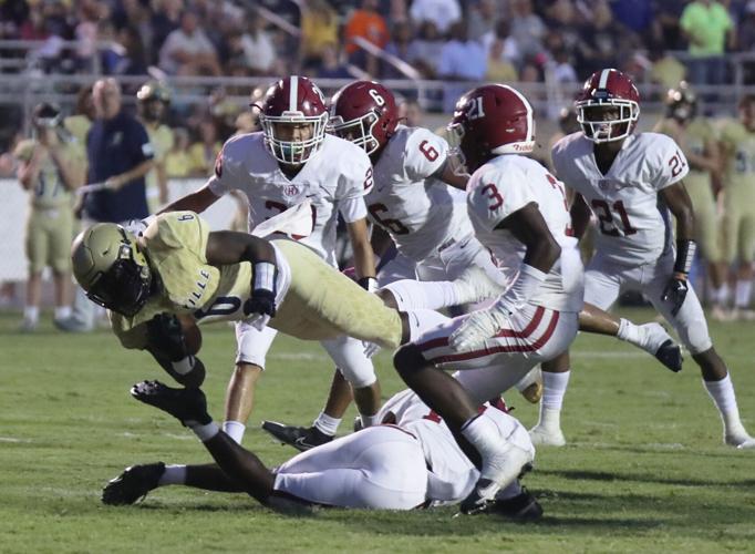 Photos Jacksonville vs. Handley action, band and cheer shots