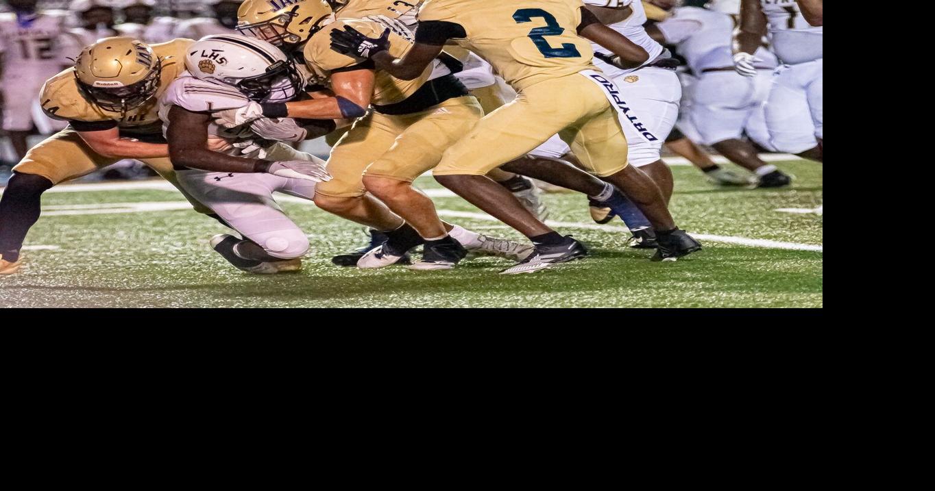 Prep football: Collins' late interception seals Jacksonville's win over Lincoln