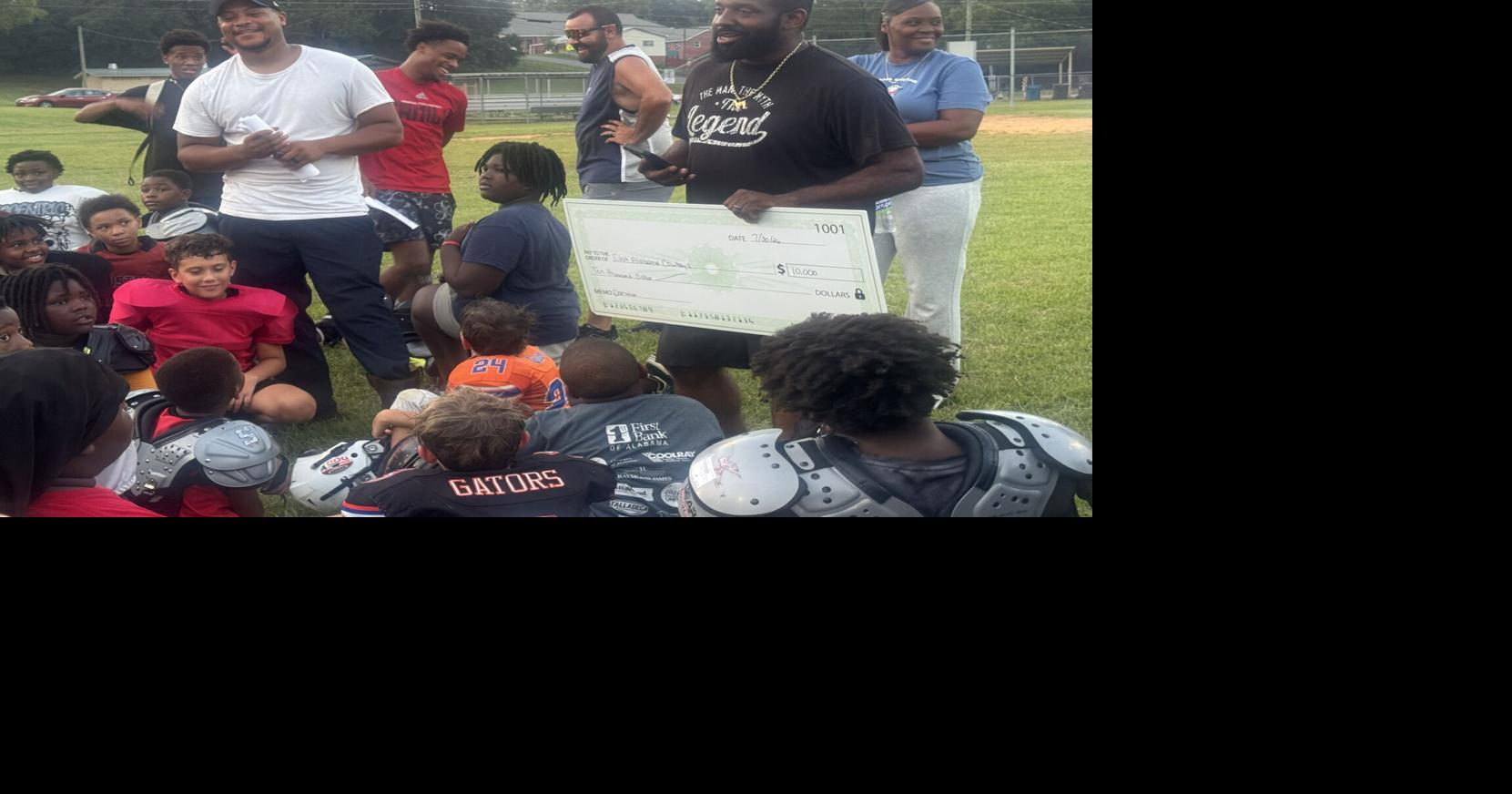 Photo gallery: Anquon Fegans gives back with $10,000 donation to East Alabama Cowboys