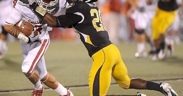 Kevin Rutland attempts to take down Kenny Stills (copy)