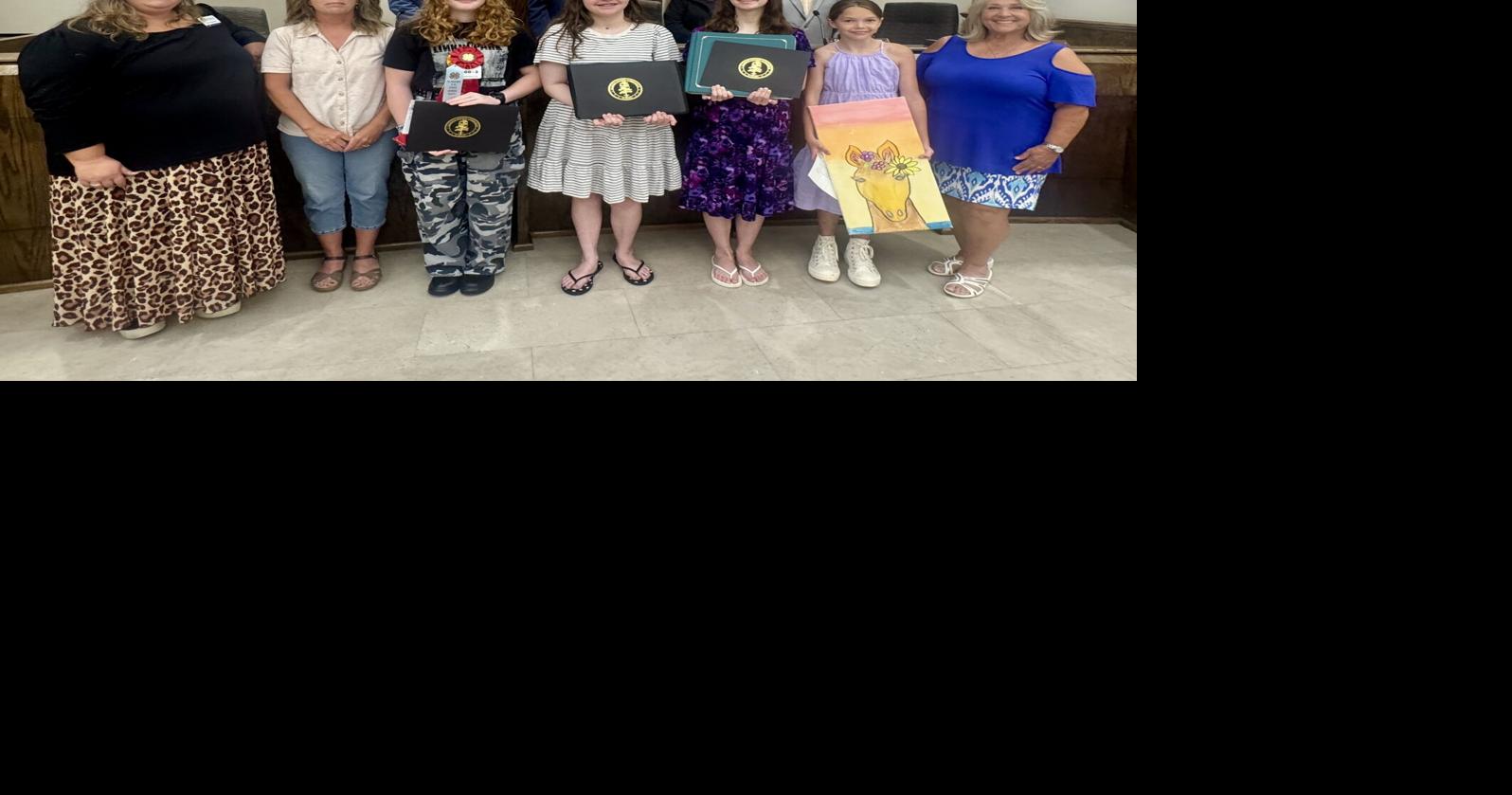County honors photojournalist, gardener and 4-H students