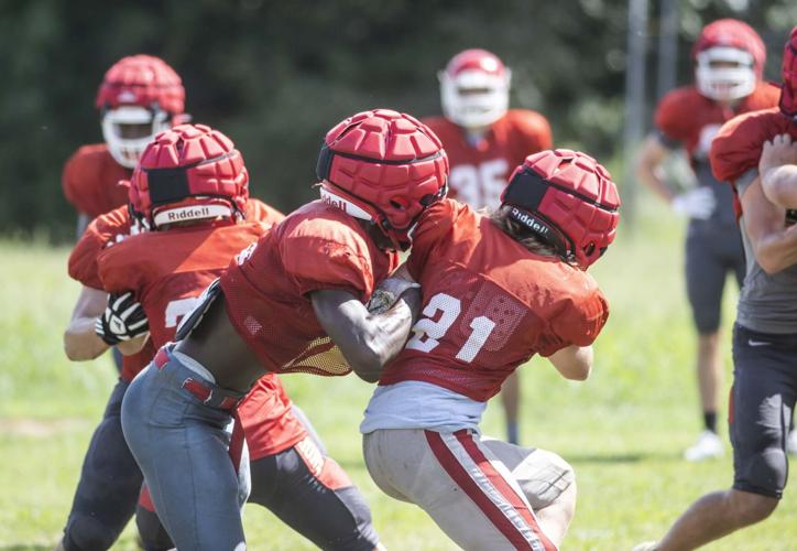 Photos Munford prepares for football season Slideshows