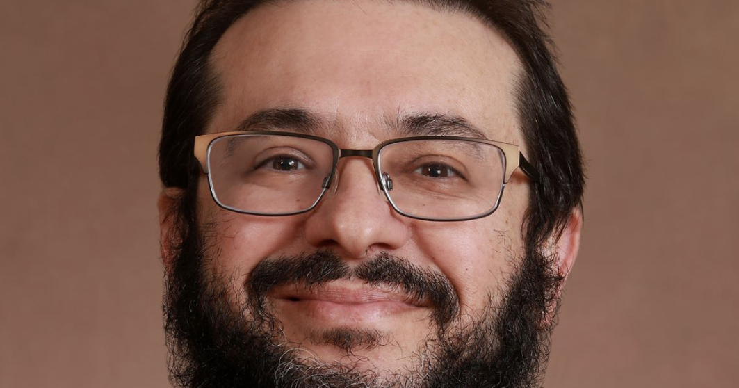 Local physician Mohamad Eloubeidi presides at professional conference