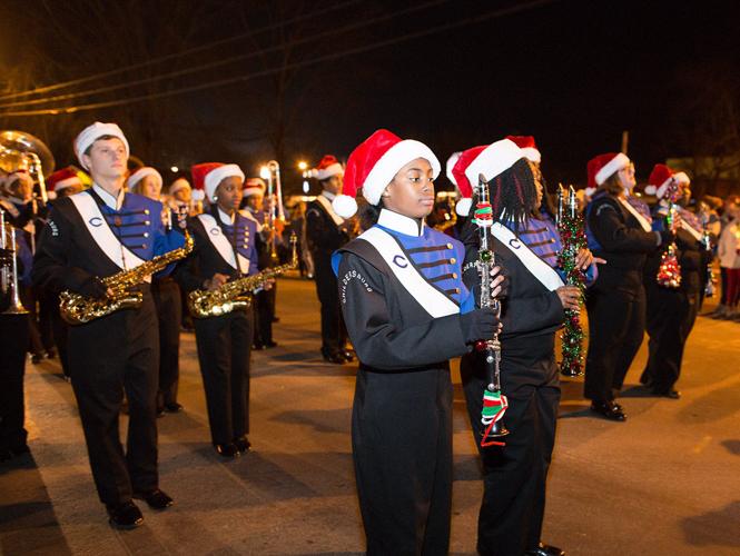 Residents line downtown streets, celebrate holiday season with