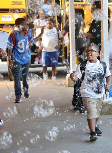 Songs and bubbles greet students on the first day of school at Golden ...