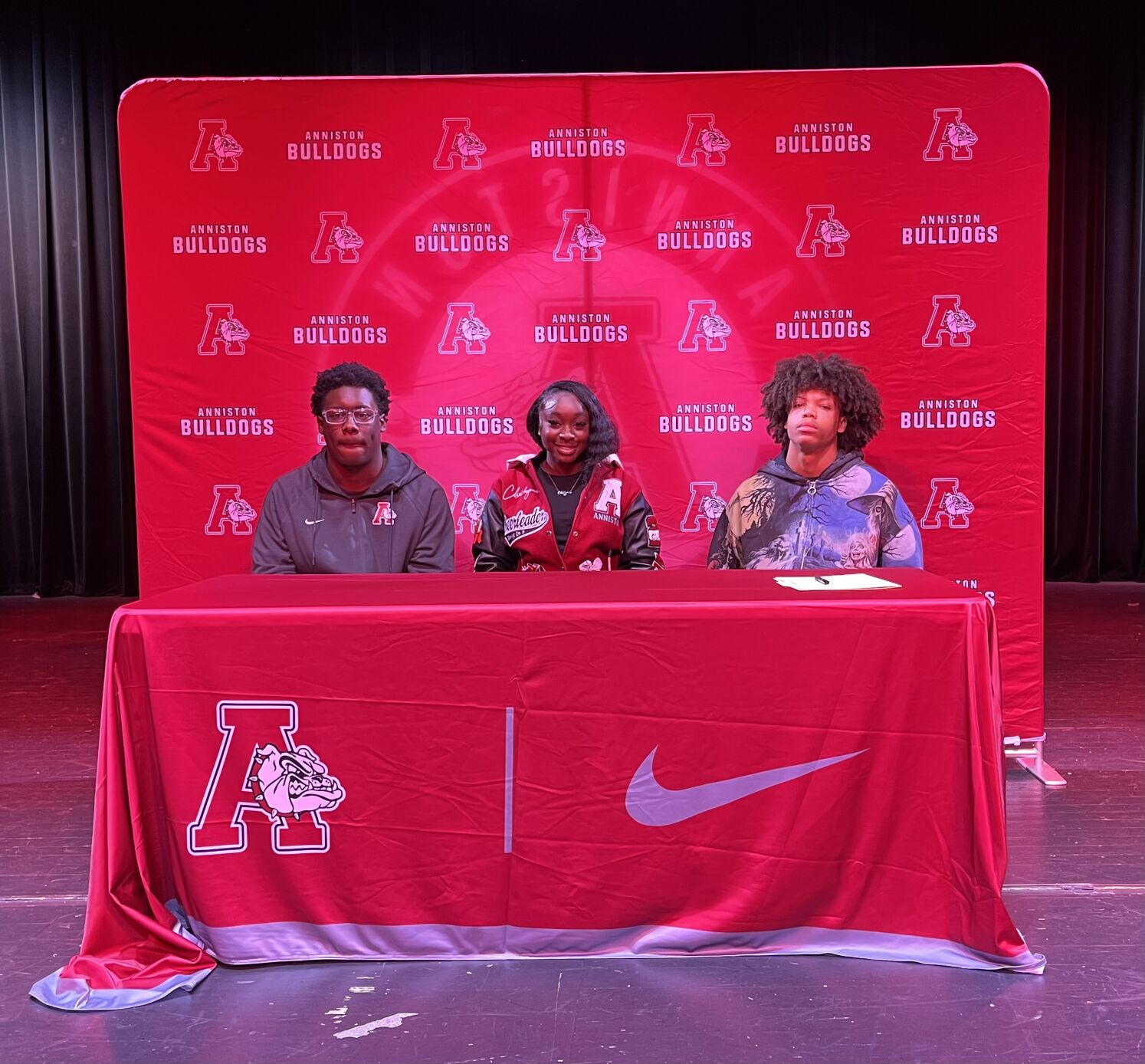 Anniston's Lewis, Thomas sign football scholarships; Reed makes school