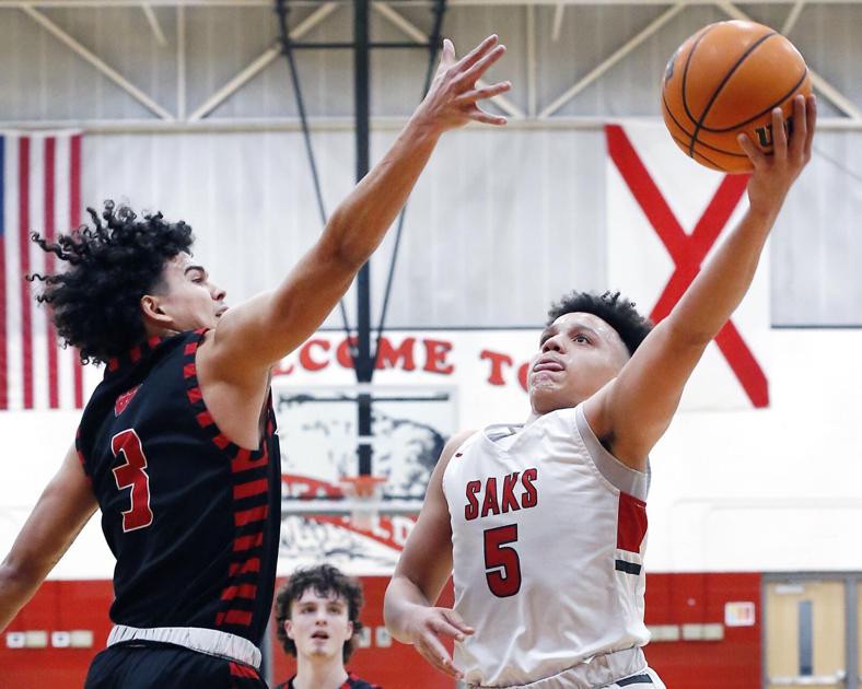 AnnistonStar.com - Sub-regional basketball: Saks responds to Miller's challenge, eliminates Weaver image