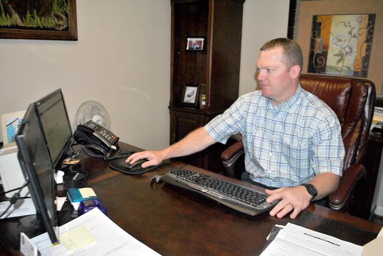 Derrick Davison continues in dad’s footsteps at Davison Insurance