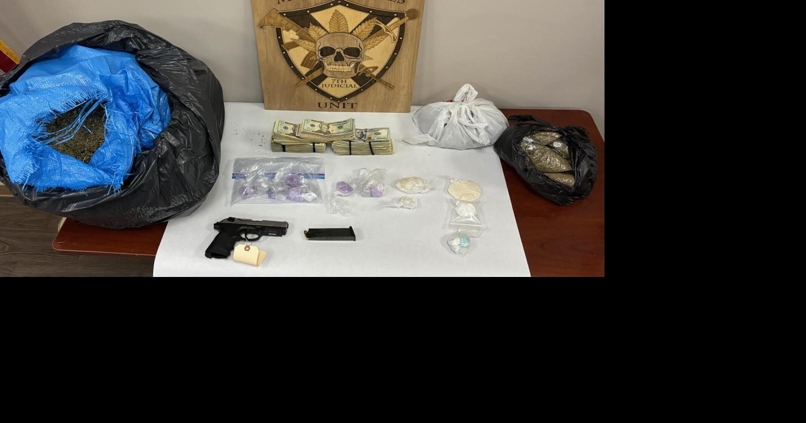 Task Force seizes drugs, firearms and cash in sizable bust | Free ...