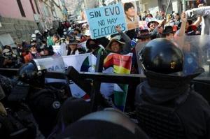 20 detained, officers injured as Morales supporters clash with police in Bolivia