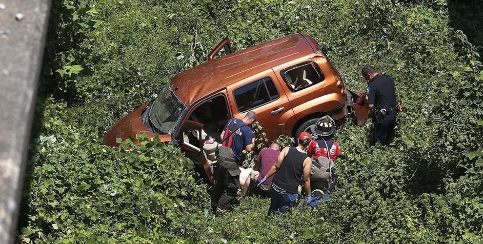Driver airlifted to hospital after crashing down embankment on Highway
