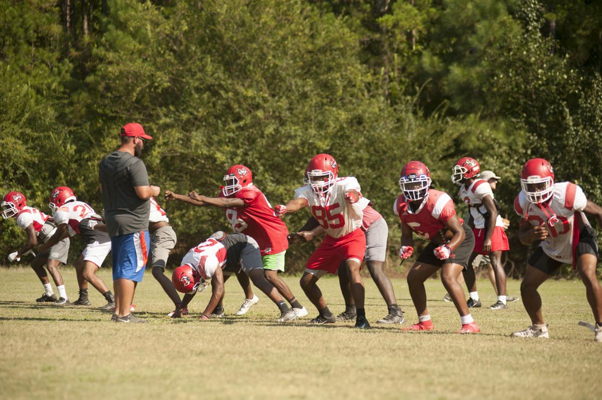 Talladega High School football team, band work through summer heat