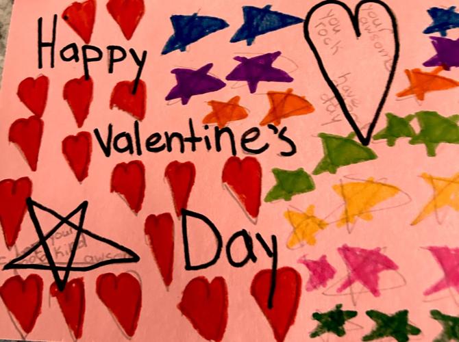 Haugen Elementary student make Valentines for veterans Photos apg