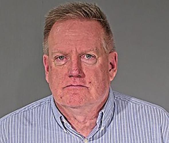 Wisconsin warden and 8 staff members charged following probes into