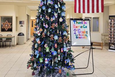 County #39 s first graders decorate tree at Justice Center News apg wi com
