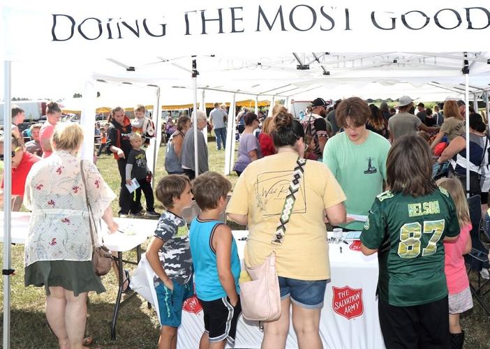 Salvation Army gives away 700 backpacks at two Family Fun Day events