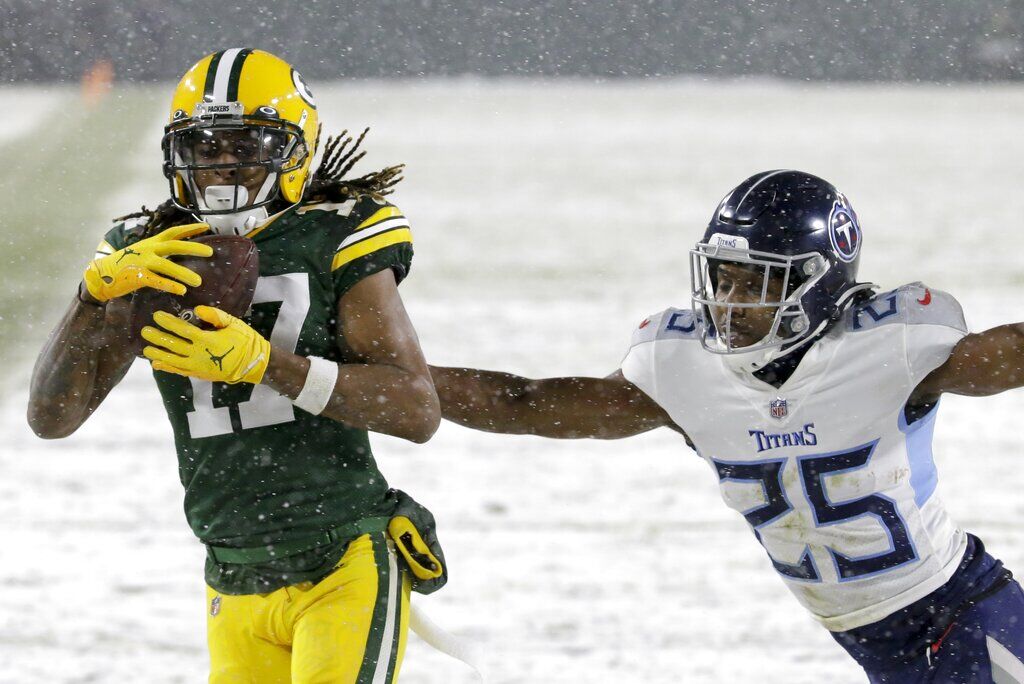 Adams Shines In Snow As Packers Trounce Titans, 40-14