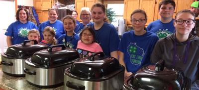 Kids from Cameron serve breakfast