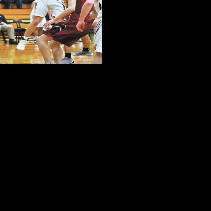 Cane boys hoops squad runs and guns, beats the Spooner Rails