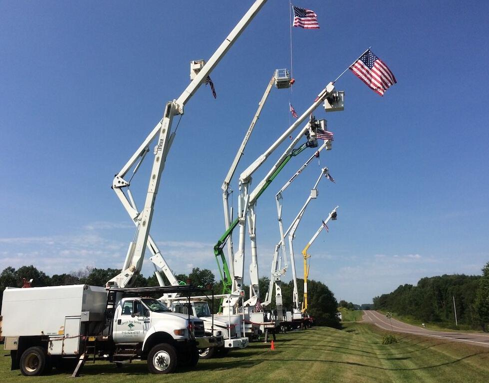Tree service trucks line up for giant show of support