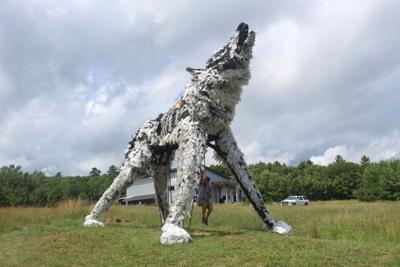 Wolf Moose Sculptures Stare Each Other Down Across Bay