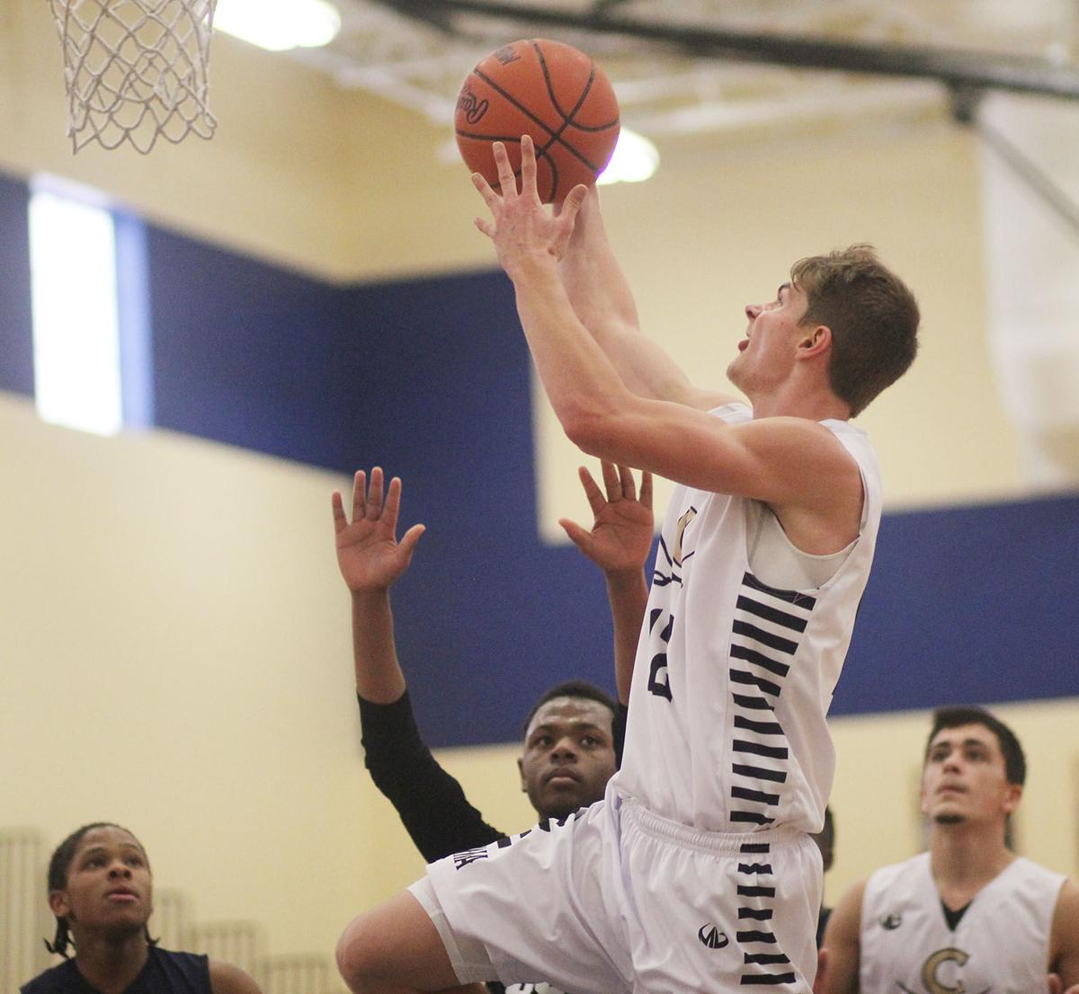 Boys Basketball Corunna Cruises Over Madison Academy 63 15