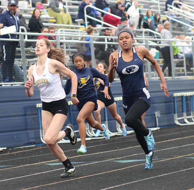 TRACK AND FIELD Corunna boys, girls rule the Red again Local Sports