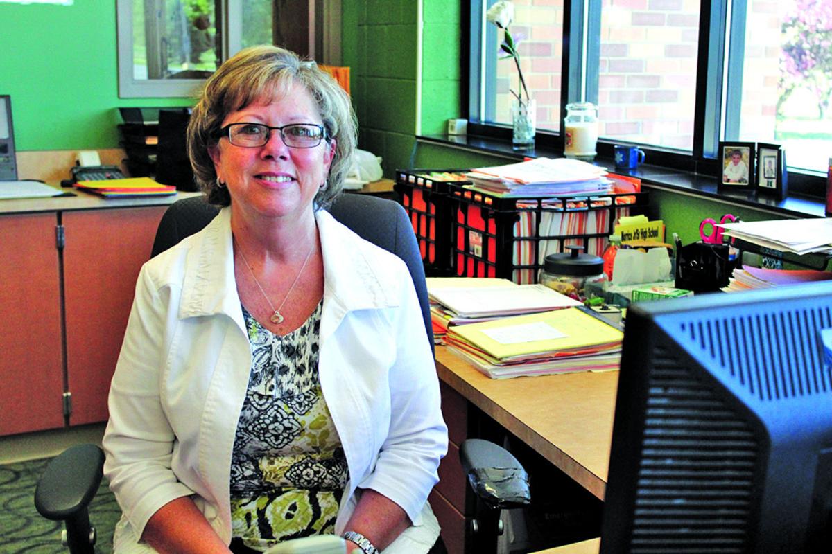 School secretary always willing to assist Local News