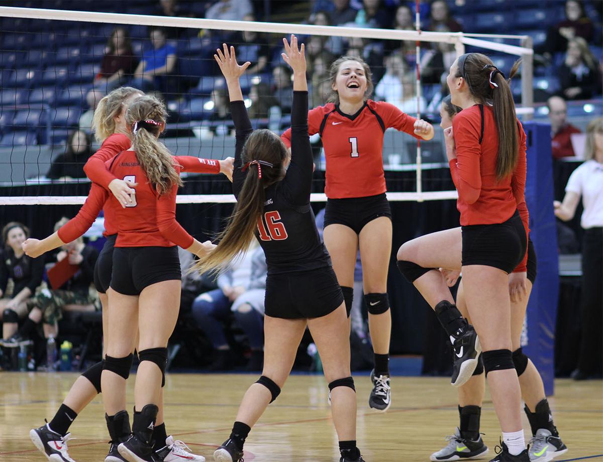 Laingsburg volleyball team celebrates win over Wixom St. Catherine in