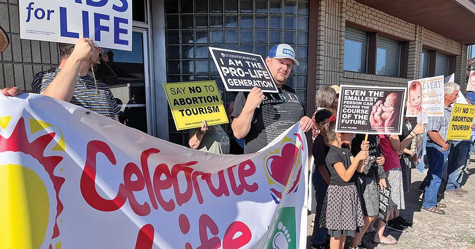 Pro-life advocates line sidewalk in peaceful protest near potential future home of Planned Parenthood - Vimarsana News
