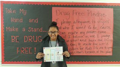 Student wins poster contest by showcasing art as a ‘natural high’