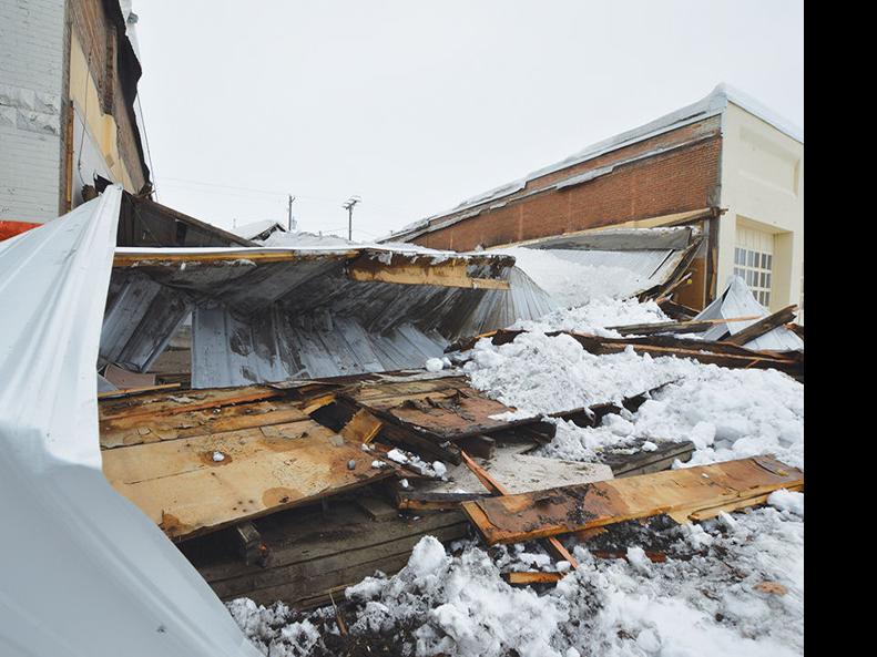 Roof caves in on downtown business Local News Stories