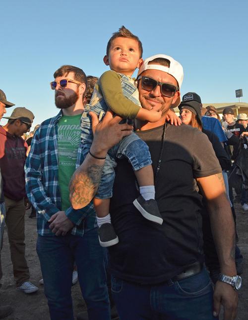 Father and son enjoy the show