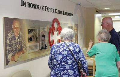 Hospital dedicates wall to priest known by parishioners as 'Father Kirk'